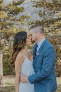 couple kiss during wyoming elopement
