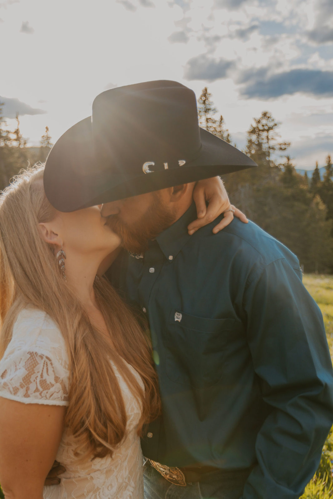 Sunset Kiss During Engagement Shoot