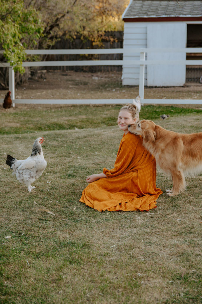 Morgan with Chicken for Fall Harvest Photoshoot