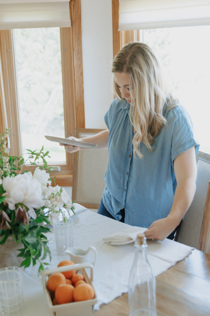 Kacey Setting Table During Food Blog Photoshoot