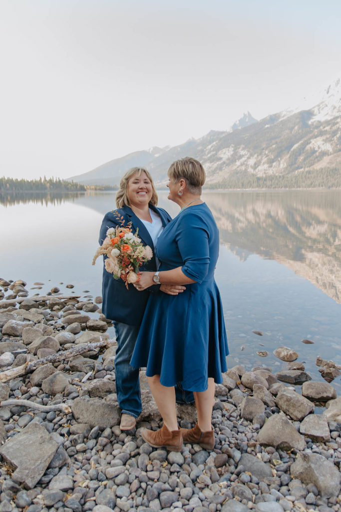 How to Plan a Jackson Hole elopement. Beth and Haley Smile During Mountain Elopement outside of Jackson Hole that was planned with Foxtails and Elope jackson