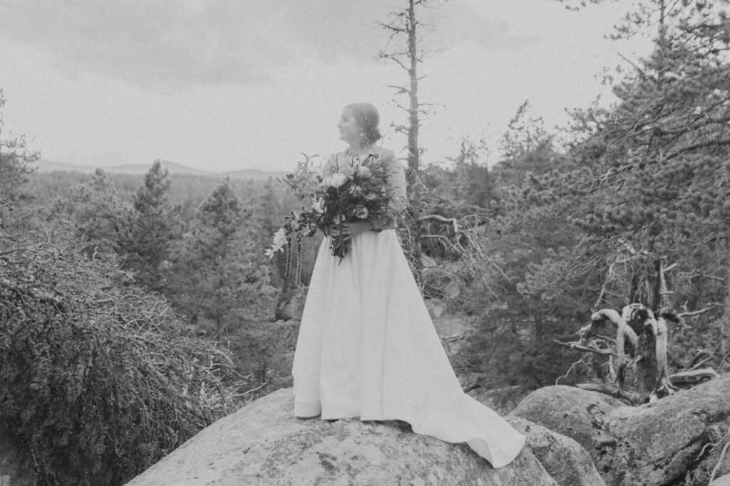 Black and White Photo of Bride During Sunset