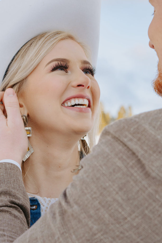 Bride Laughs During Winter Wedding in Buffalo Wyoming