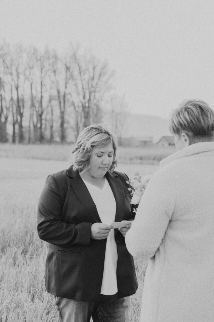 Black and White Photo of Vow Exchange in Wyoming
