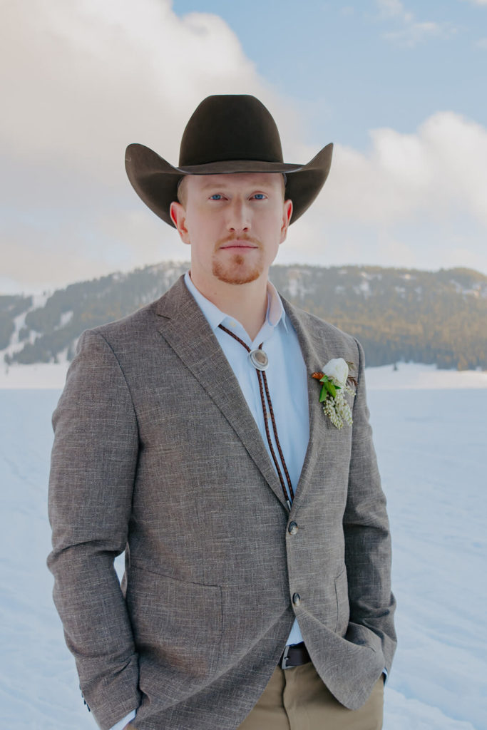 Groom Portrait for Winter Wedding with Snow