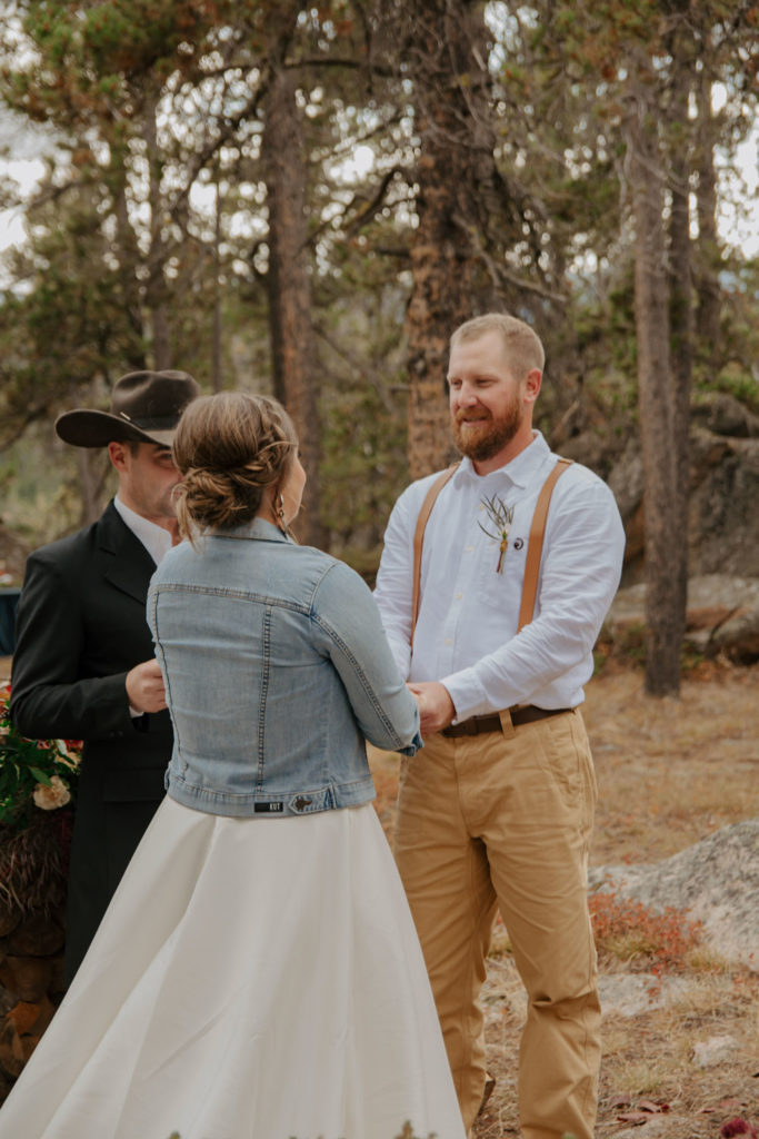 Groom Looking at Bride During Fall Elopement Ceremony