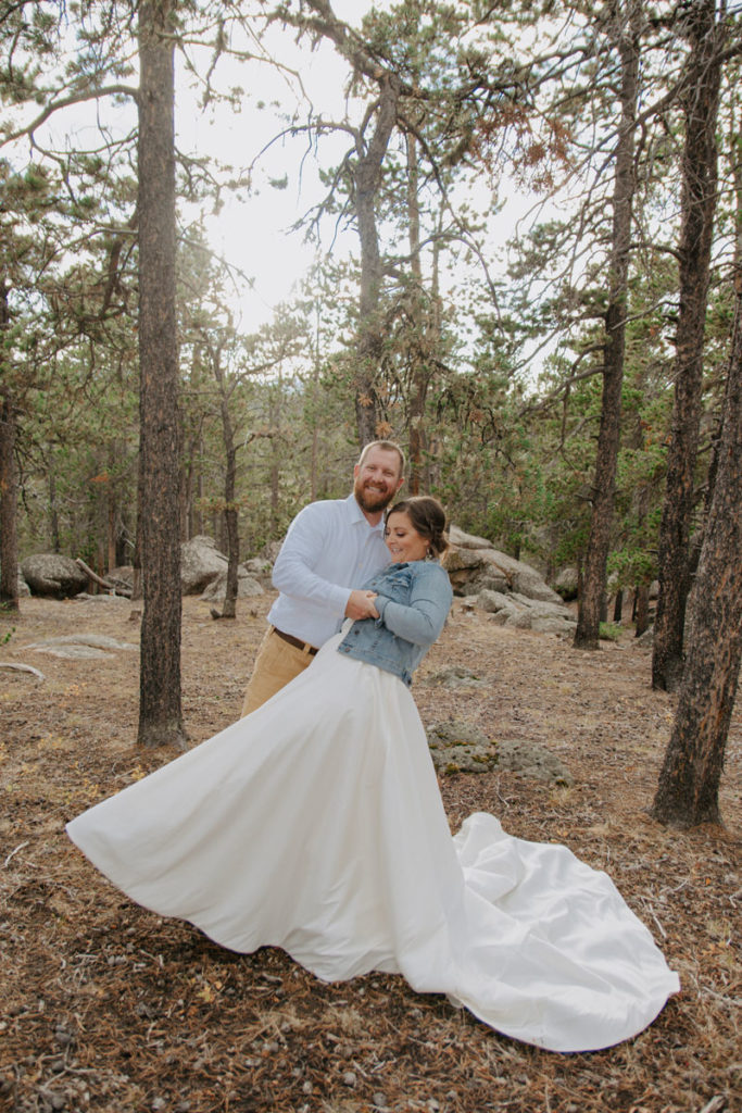 Groom Dips Bride during Outdoor Wedding in Wyoming