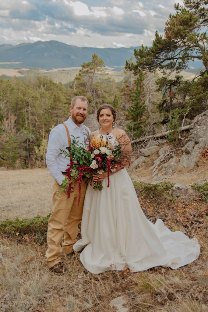 Couple Photo with Large Bouquet for Fall Wedding