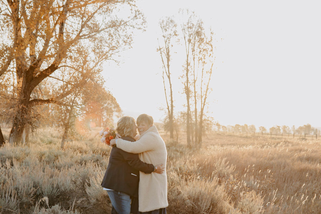 Photo of Couple at Sunrise During Wyoming Destination Elopement