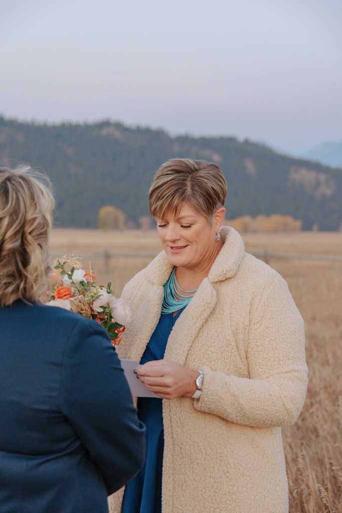 Partner Reading Vows During Elopement