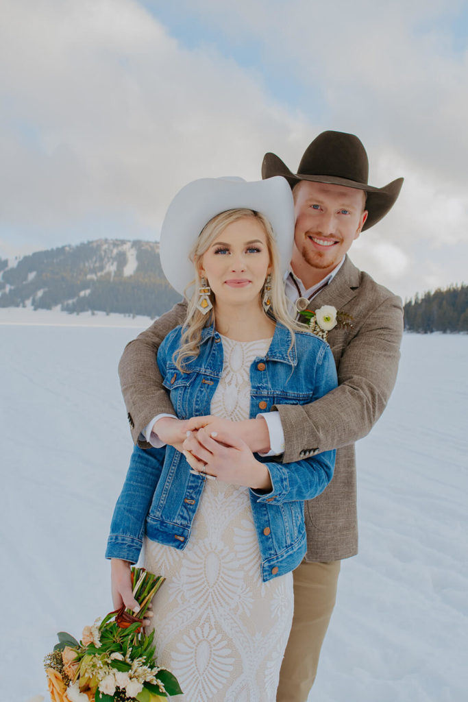 Bride and Groom at Snowy Winter Wedding in Wyoming