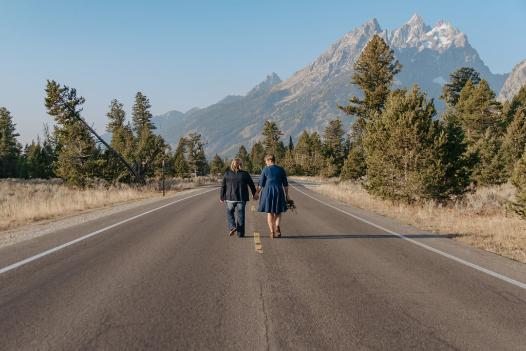 Haley and Beth Walking Down Road in Grand Tetons National Park