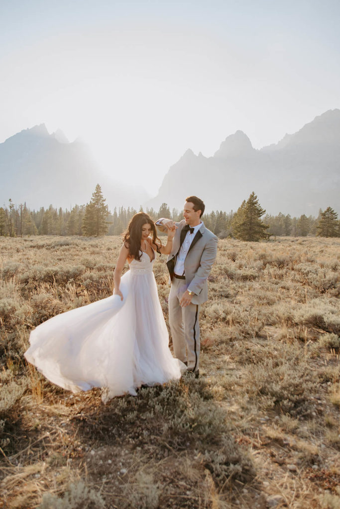 Clay Spins Rachel During Elopement Photosession near Tetons
