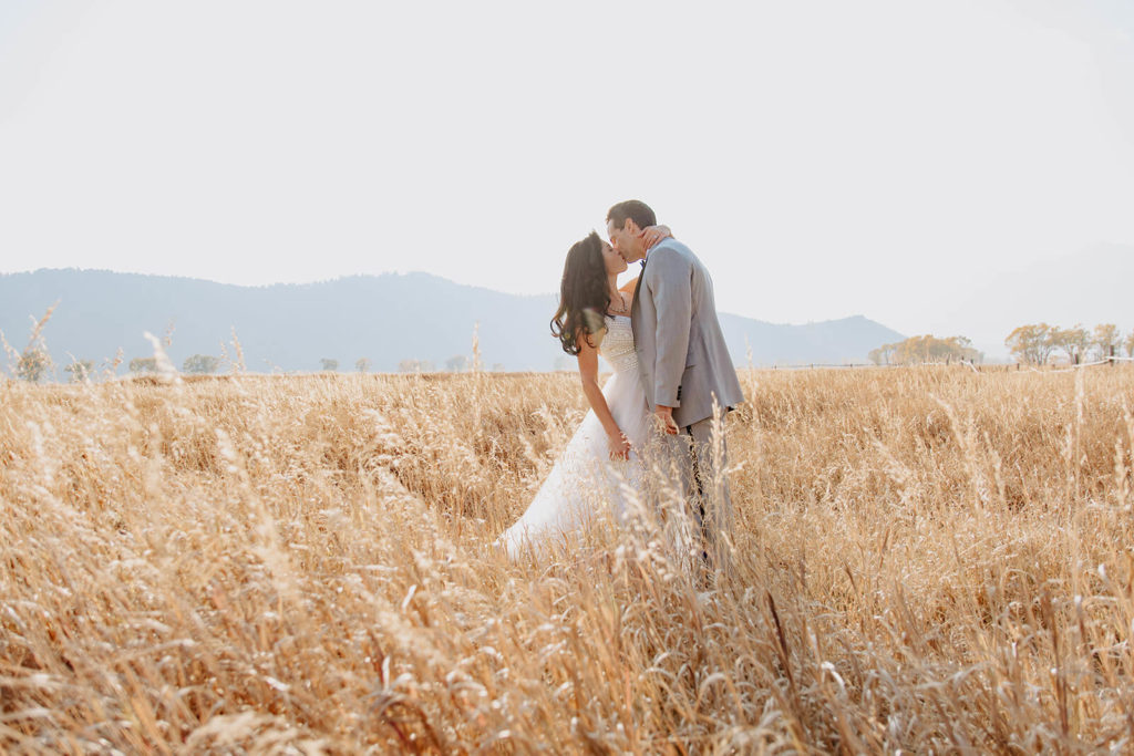 Landscape Photo of Couple Kissing after Wyoming Elopement