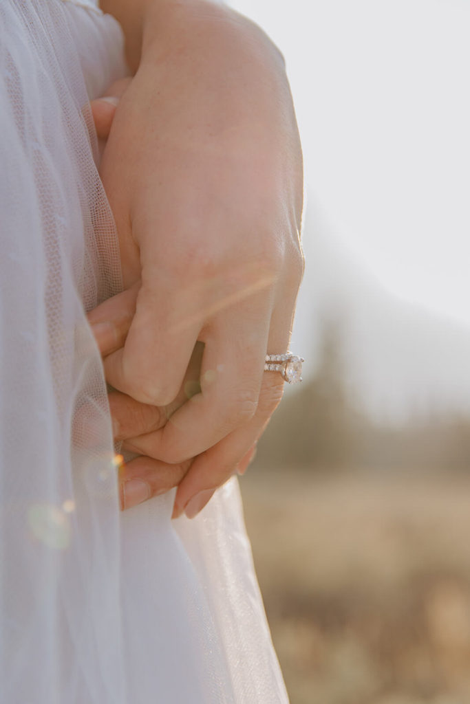 Rachel's Wedding Ring with Sun in Background