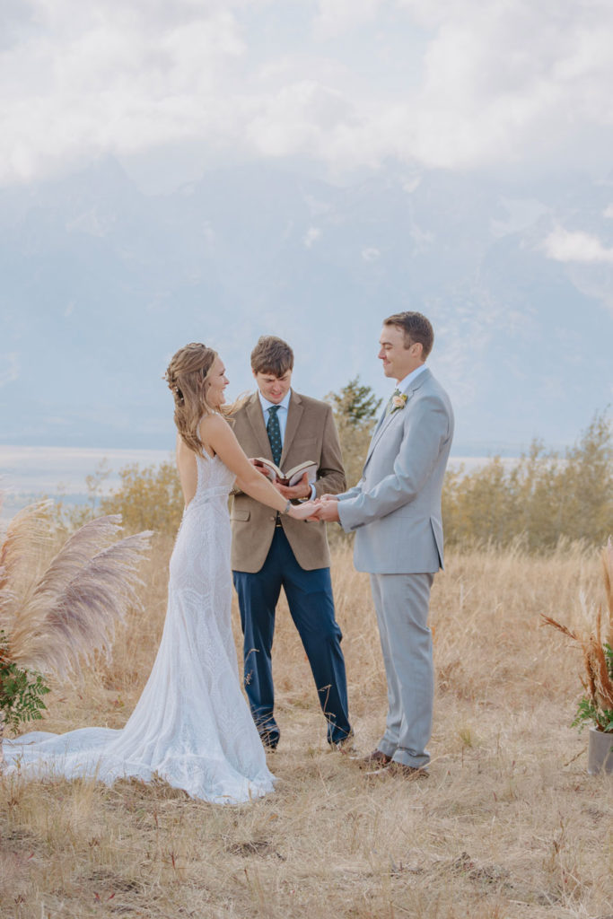 Vanessa and Camden at Wedding Ceremony with Tetons in Background