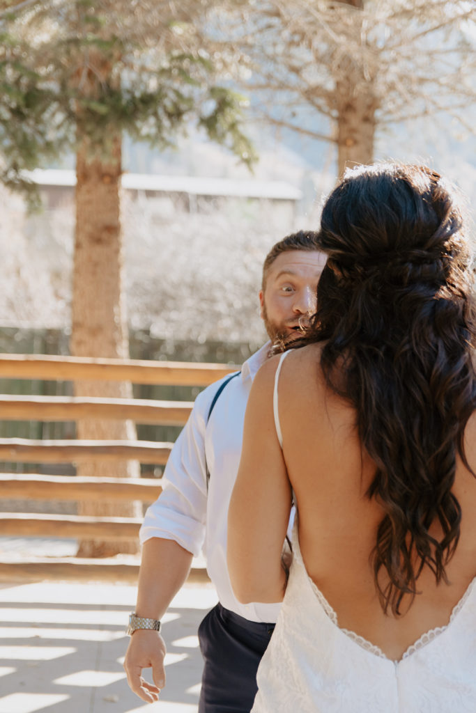 Groom sees bride for the first time in Jackson Hole, Wyoming at The lodge