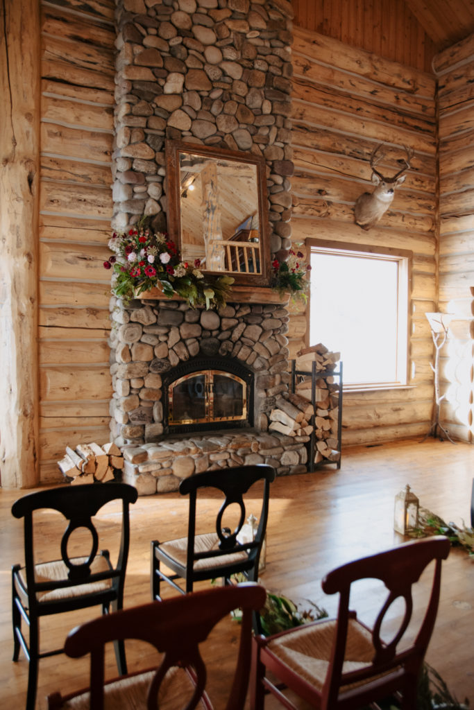 PLanning your Jackson Hole Wedding. Fire place decorated for wedding at Bentwood Inn in Jackson Hole, Wy