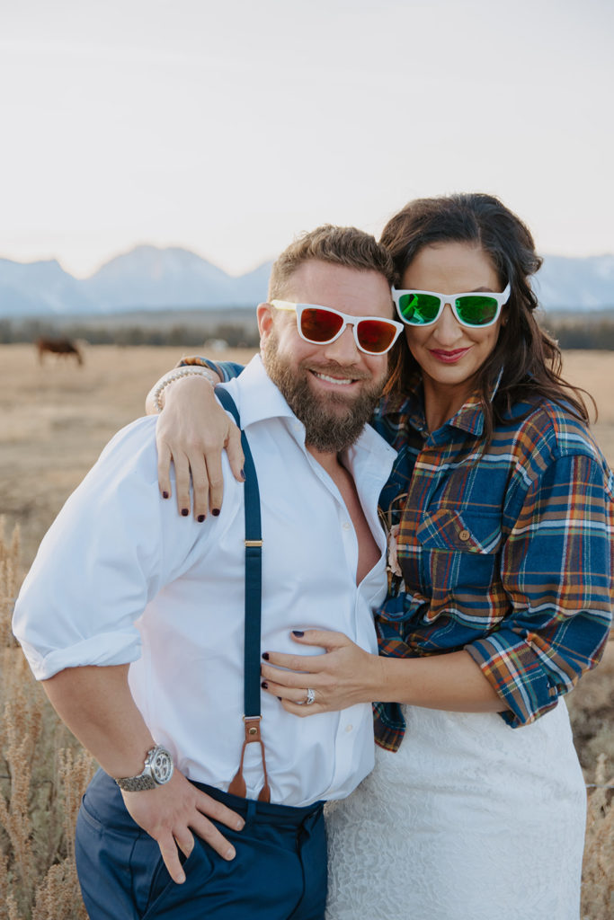 Bride and groom wearing sunglasses in Jackson Hole, Wyoming