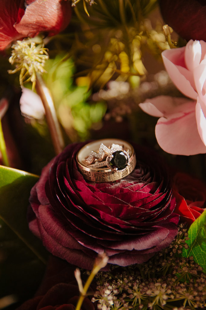 Wedding rings on bridal bouquet from a Jackson Hole Elopement Package