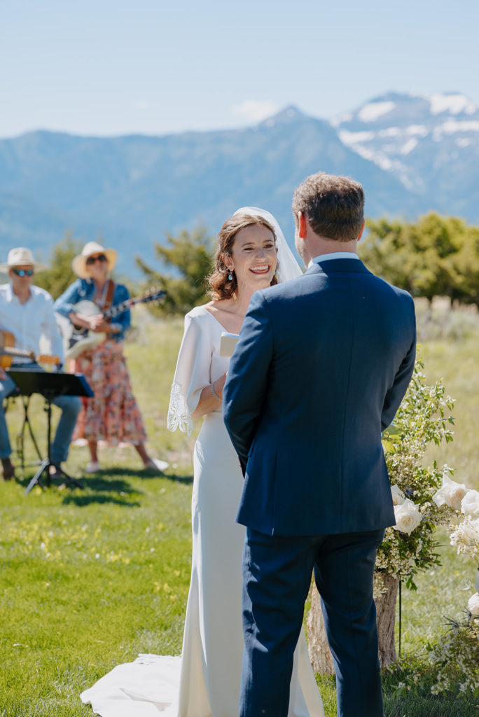 Couple says vows during wedding at a Jackson Hole wedding venue