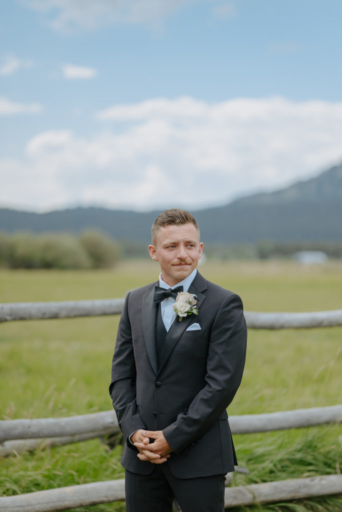 Groom waiting for his bride at Diamond Cross ranch. 