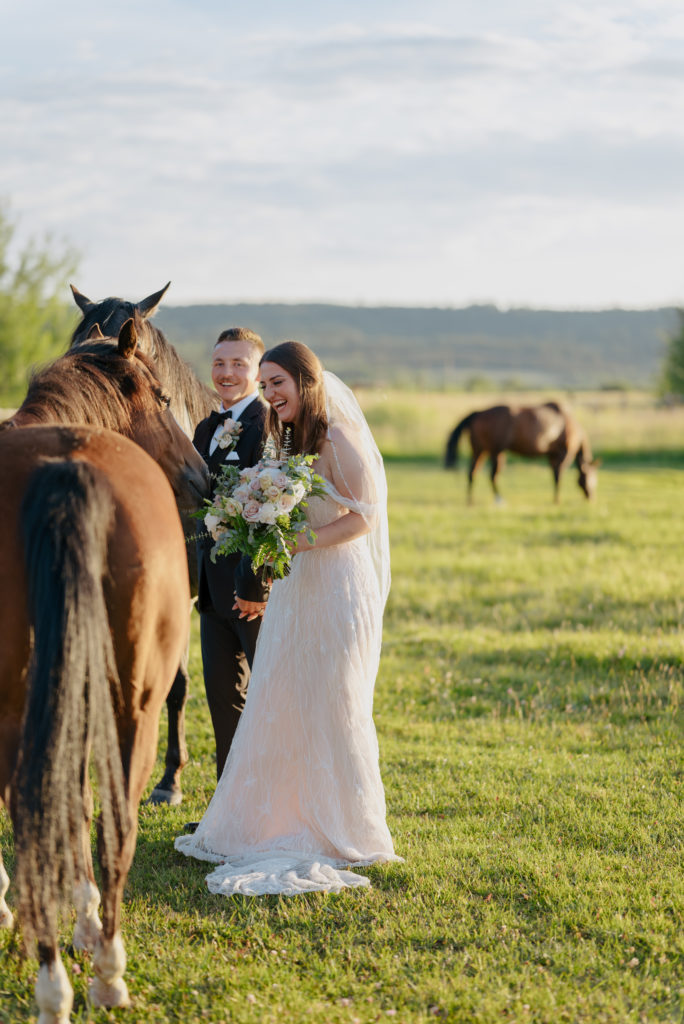 Bride and groom photo ops with brown horse at Diamond Cross ranch. 