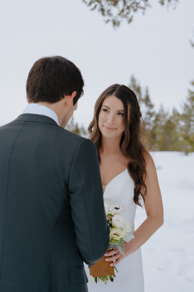 Bride looks at groom during their elopement at The Wedding Tree